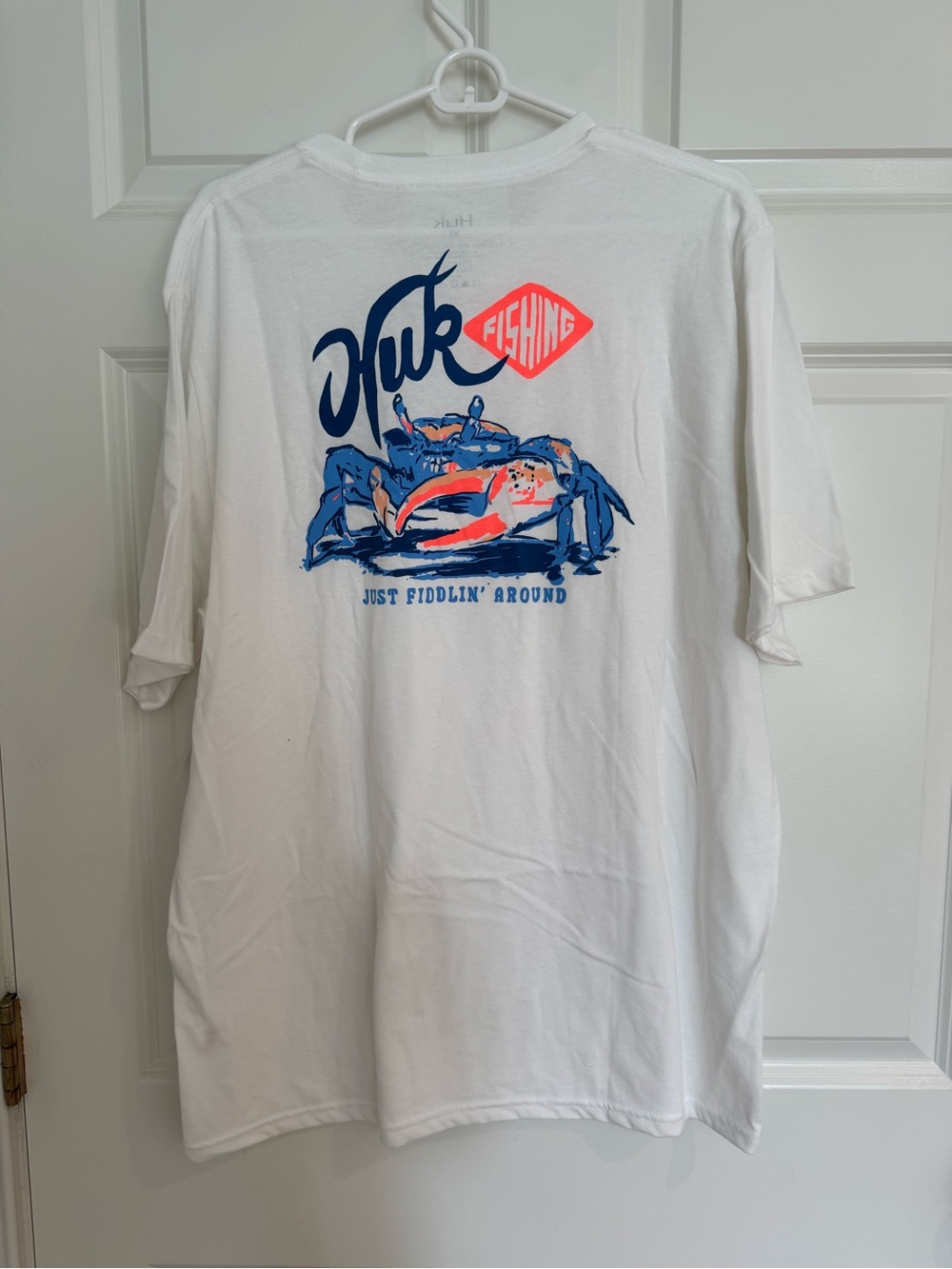 Huk White Short-Sleeve Logo Tee with Blue and Red Accents